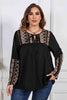 Melo Apparel Plus Size Printed Round Neck Tie Front Blouse